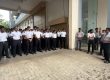 Students and staff gathered at the assembly area during the emergency fire drill
